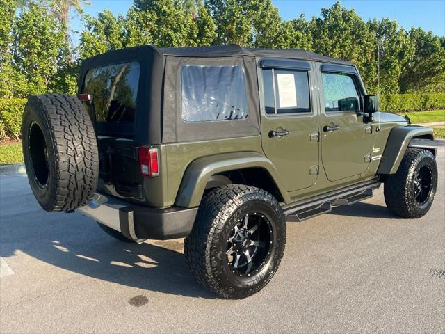 used 2015 Jeep Wrangler Unlimited car, priced at $21,497