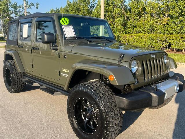 used 2015 Jeep Wrangler Unlimited car, priced at $21,497