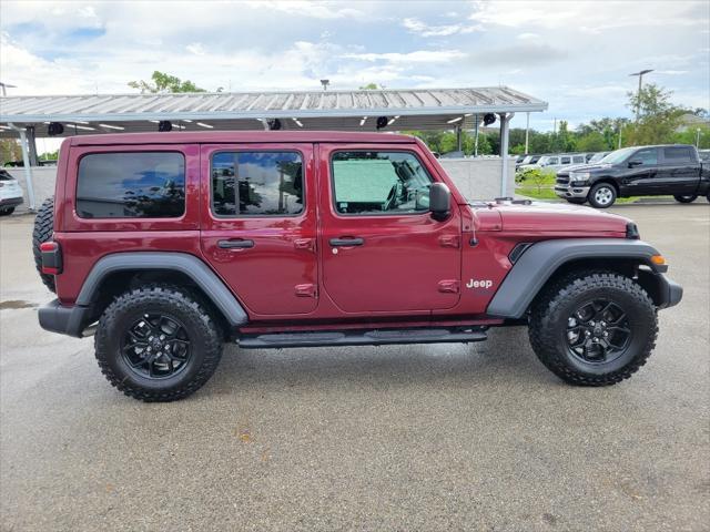 used 2021 Jeep Wrangler Unlimited car, priced at $36,987