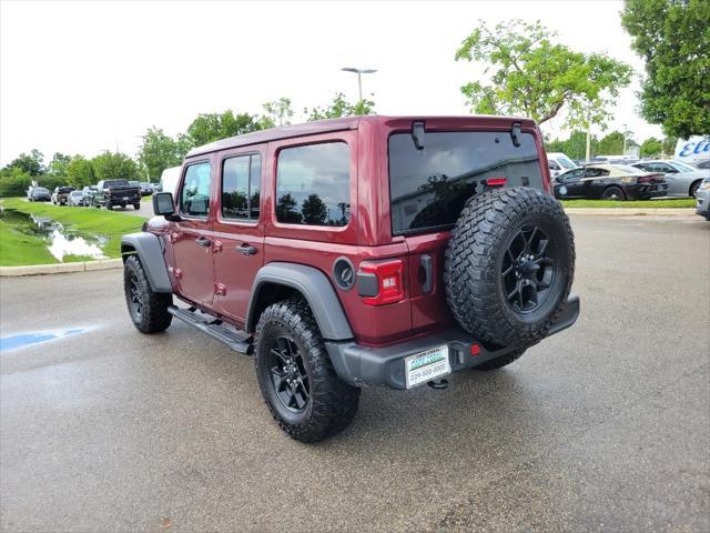 used 2021 Jeep Wrangler Unlimited car, priced at $36,987