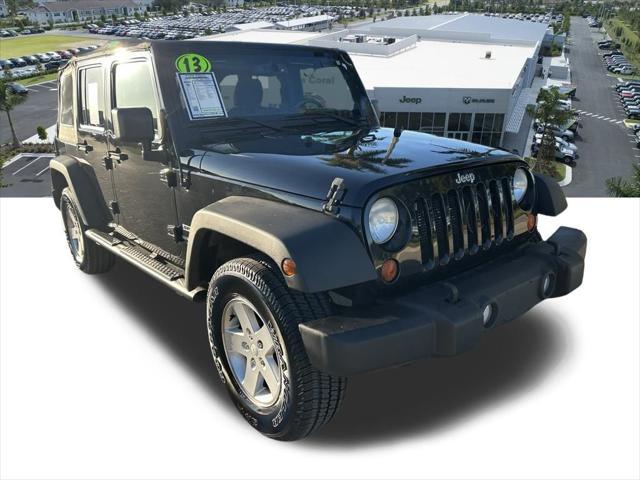 used 2013 Jeep Wrangler Unlimited car, priced at $12,560