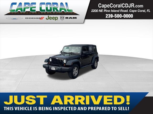 used 2013 Jeep Wrangler Unlimited car, priced at $13,485