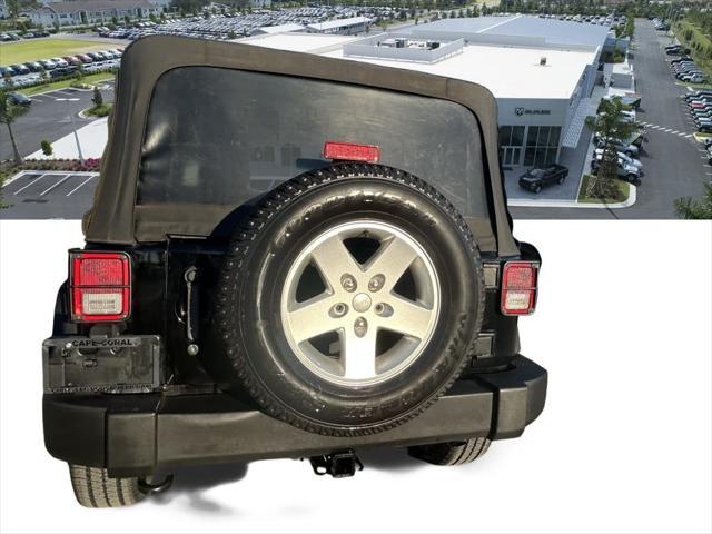 used 2013 Jeep Wrangler Unlimited car, priced at $12,560