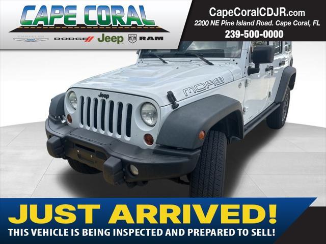 used 2013 Jeep Wrangler Unlimited car, priced at $18,997