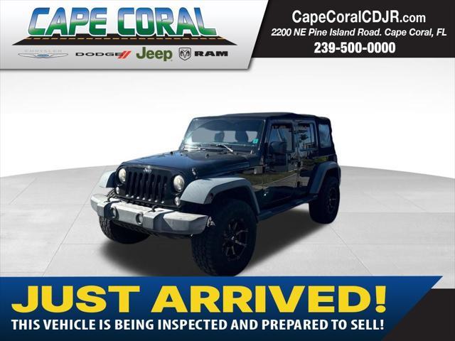 used 2016 Jeep Wrangler Unlimited car, priced at $25,997