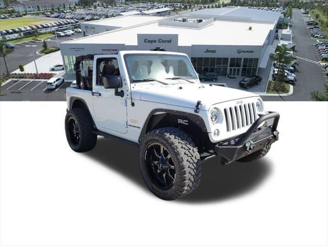 used 2014 Jeep Wrangler car, priced at $18,297