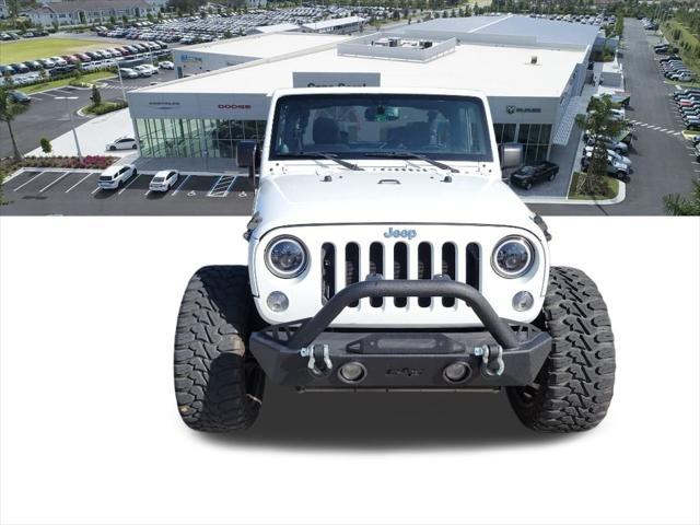 used 2014 Jeep Wrangler car, priced at $18,297