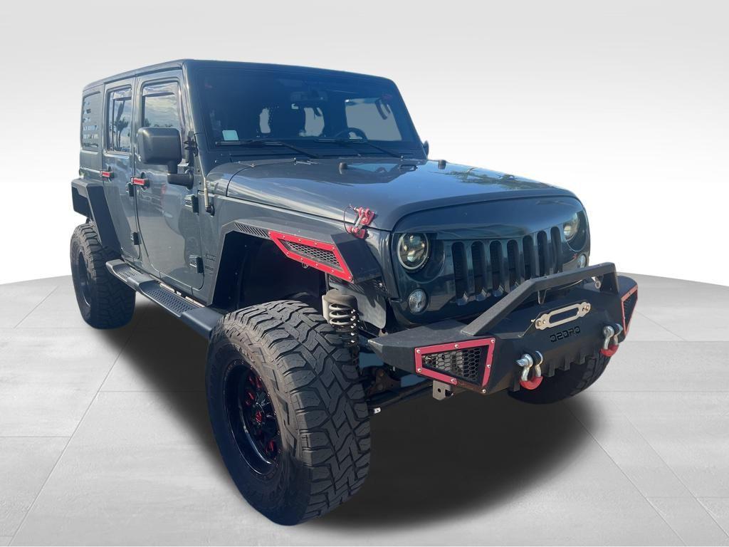 used 2016 Jeep Wrangler Unlimited car, priced at $19,379