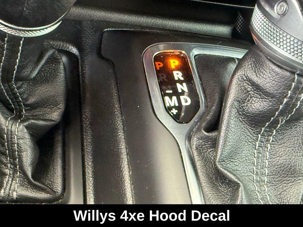 used 2024 Jeep Wrangler 4xe car, priced at $31,539