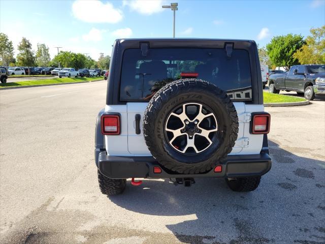 used 2022 Jeep Wrangler car, priced at $38,827