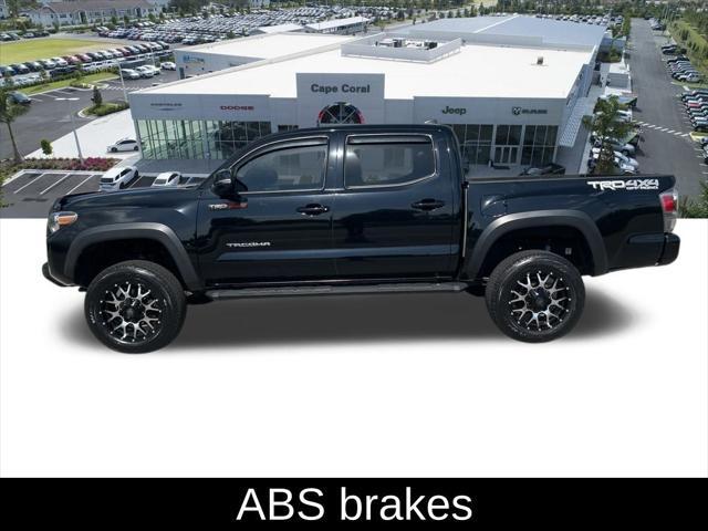 used 2022 Toyota Tacoma car, priced at $35,608
