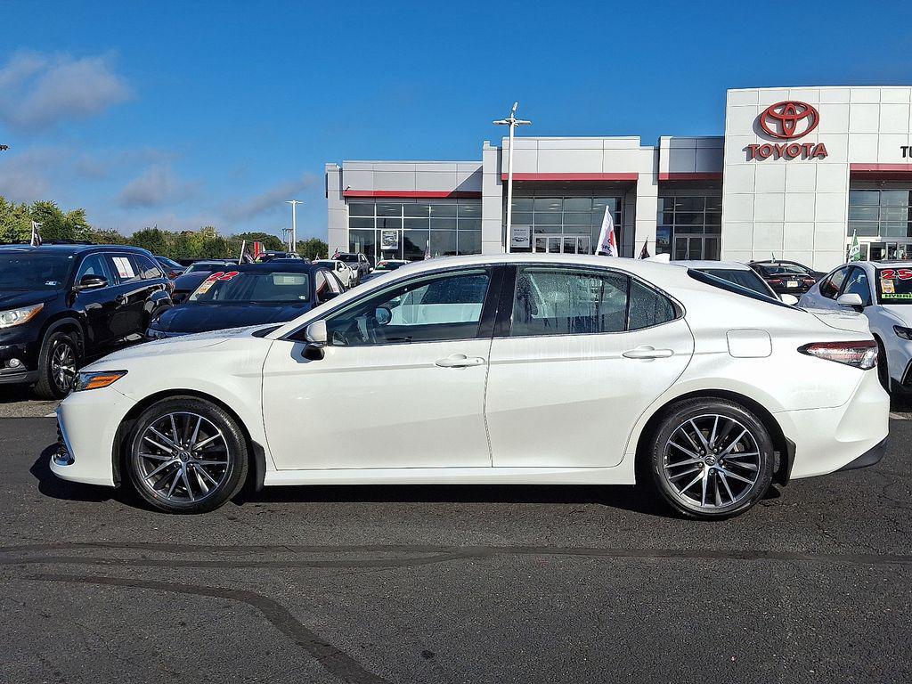 used 2021 Toyota Camry car, priced at $27,554