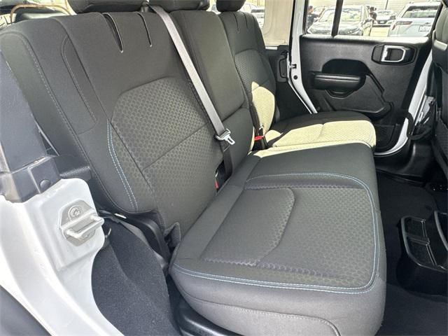 used 2024 Jeep Wrangler 4xe car, priced at $33,593