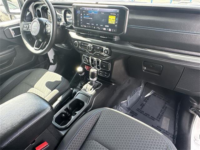 used 2024 Jeep Wrangler 4xe car, priced at $33,593