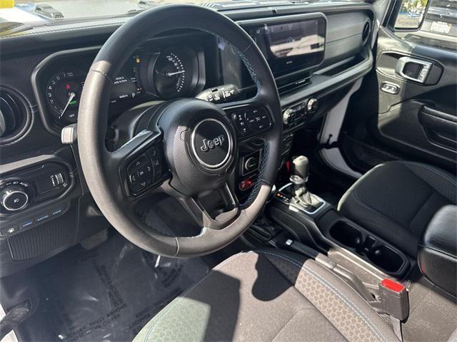 used 2024 Jeep Wrangler 4xe car, priced at $33,593