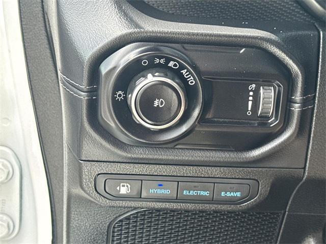 used 2024 Jeep Wrangler 4xe car, priced at $33,593