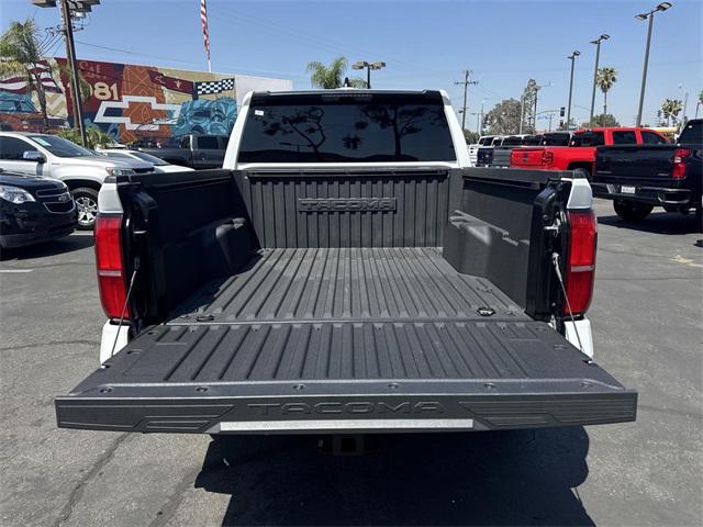 used 2024 Toyota Tacoma car, priced at $34,993