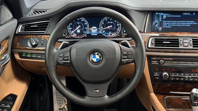 used 2014 BMW 740 car, priced at $13,699