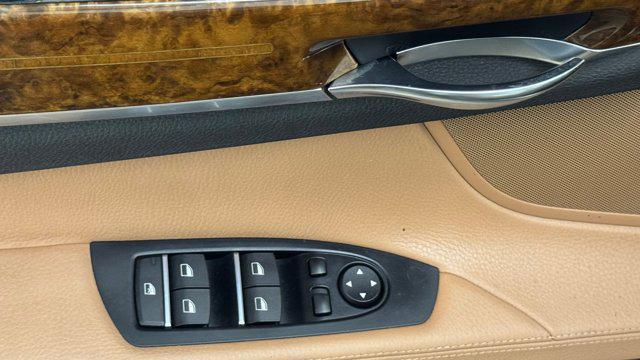 used 2014 BMW 740 car, priced at $13,699