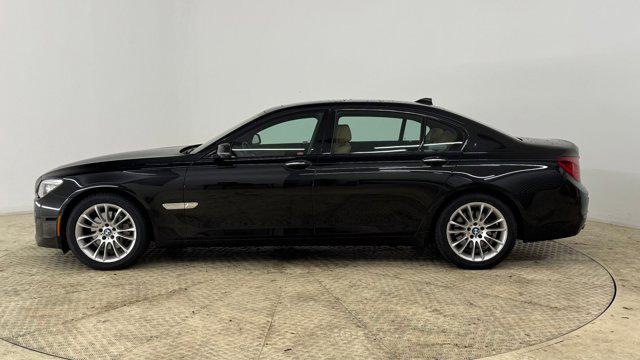 used 2014 BMW 740 car, priced at $13,699