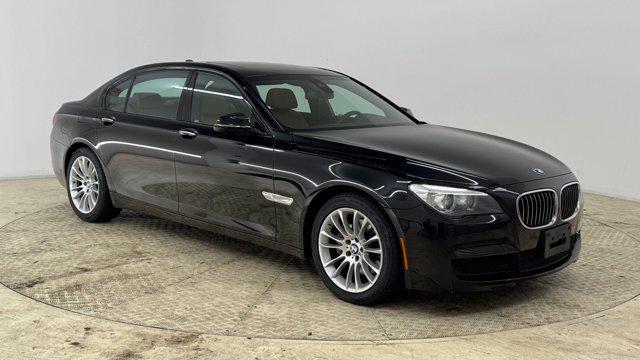 used 2014 BMW 740 car, priced at $13,699