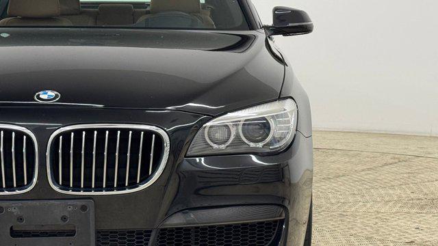 used 2014 BMW 740 car, priced at $13,699