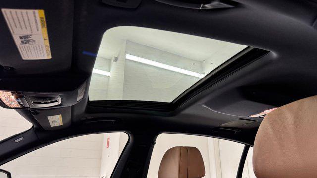 used 2014 BMW 740 car, priced at $13,699