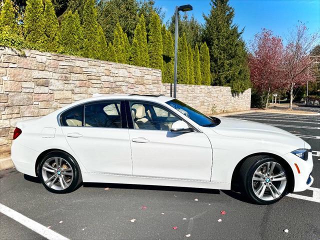 used 2017 BMW 330 car, priced at $14,900