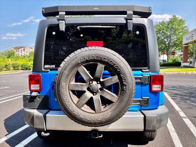 used 2015 Jeep Wrangler Unlimited car, priced at $17,900