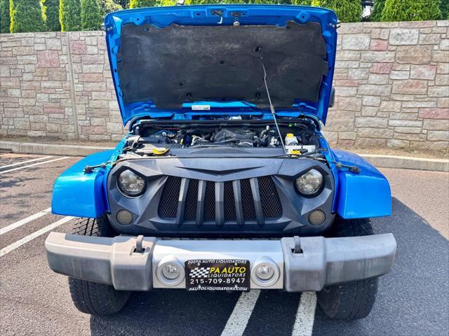 used 2015 Jeep Wrangler Unlimited car, priced at $17,900