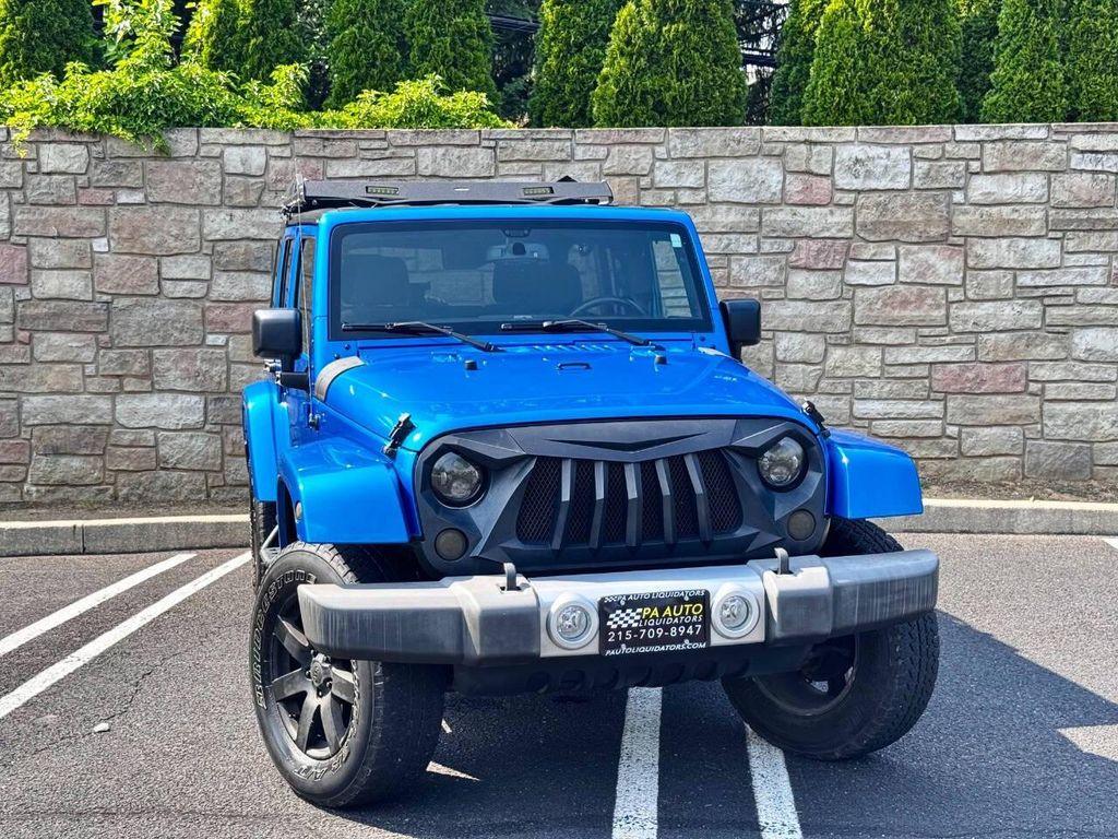 used 2015 Jeep Wrangler Unlimited car, priced at $17,900