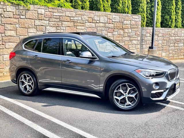 used 2018 BMW X1 car, priced at $16,900
