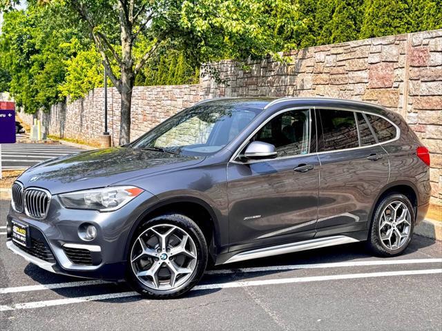 used 2018 BMW X1 car, priced at $16,900
