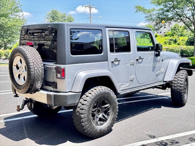 used 2015 Jeep Wrangler Unlimited car, priced at $18,900