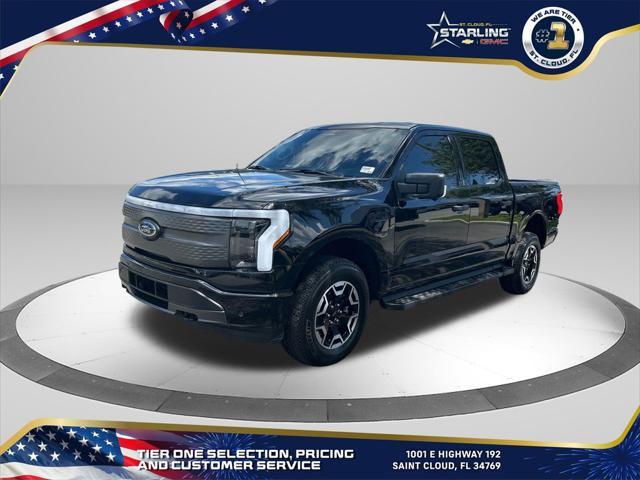 used 2023 Ford F-150 Lightning car, priced at $37,488