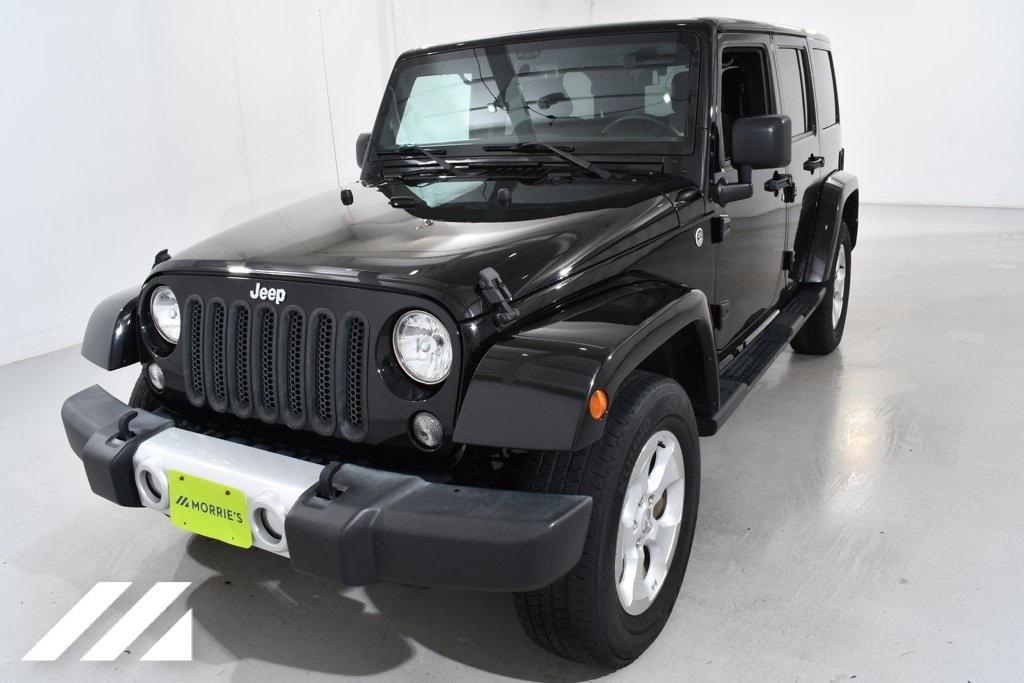 used 2015 Jeep Wrangler Unlimited car, priced at $19,555