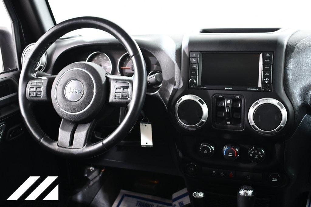 used 2015 Jeep Wrangler Unlimited car, priced at $19,555