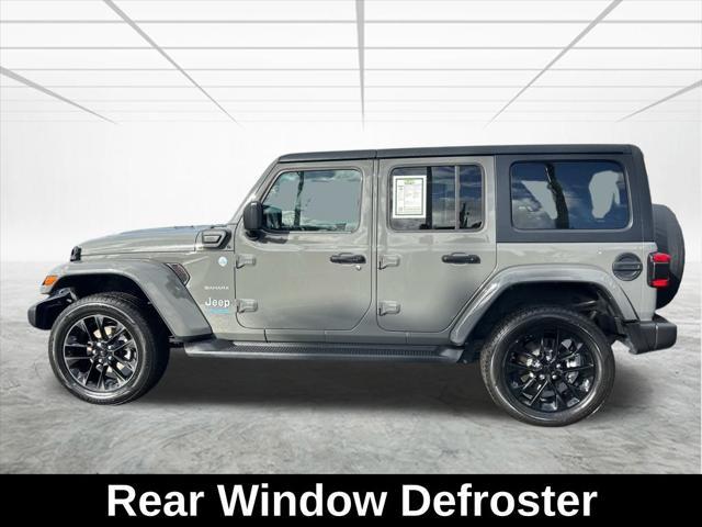 used 2021 Jeep Wrangler Unlimited car, priced at $33,159