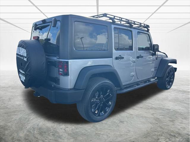 used 2017 Jeep Wrangler Unlimited car, priced at $21,686