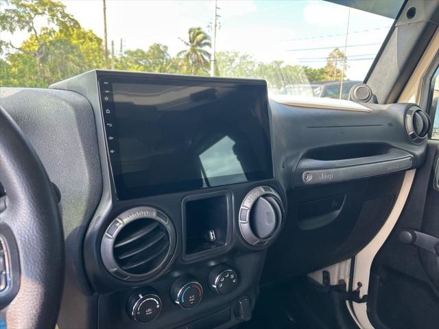 used 2011 Jeep Wrangler Unlimited car, priced at $13,144