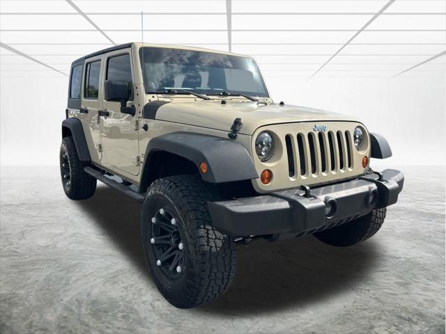 used 2011 Jeep Wrangler Unlimited car, priced at $13,144