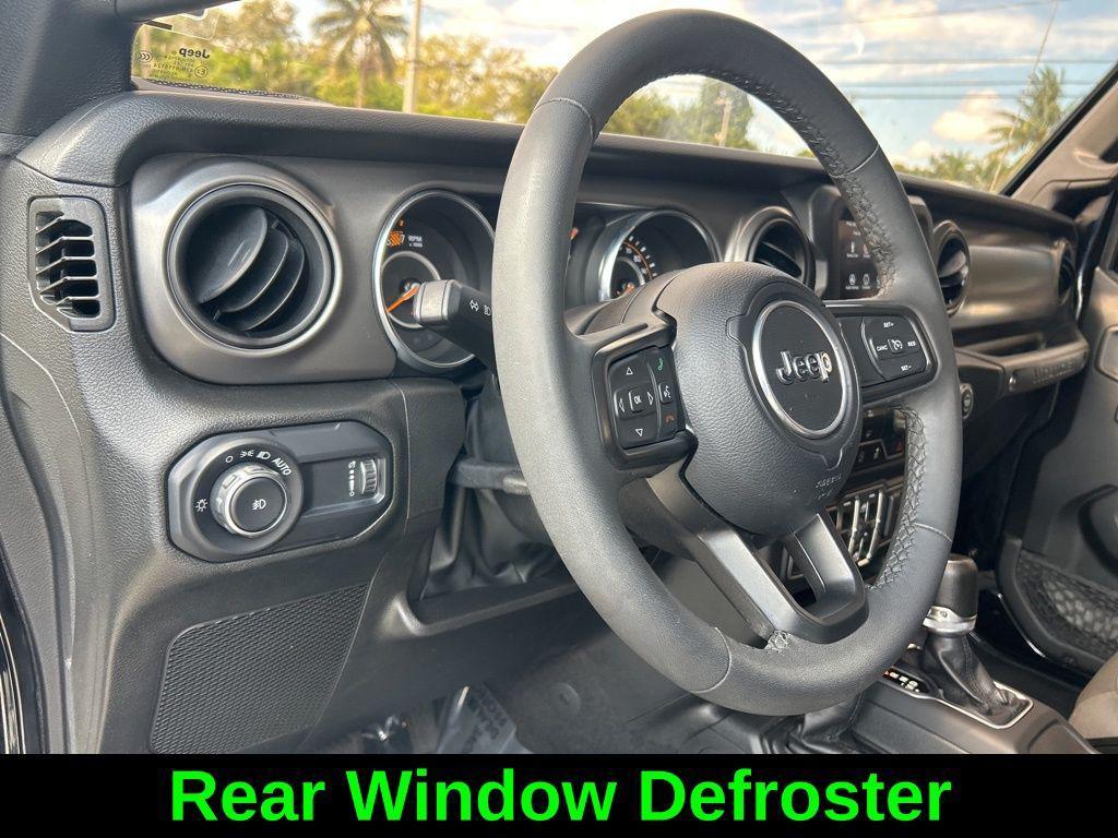 used 2023 Jeep Wrangler car, priced at $24,601