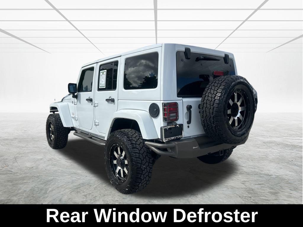 used 2014 Jeep Wrangler Unlimited car, priced at $15,345