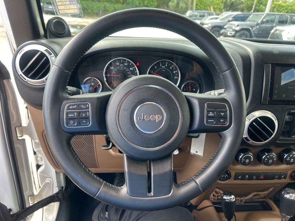 used 2014 Jeep Wrangler Unlimited car, priced at $15,345
