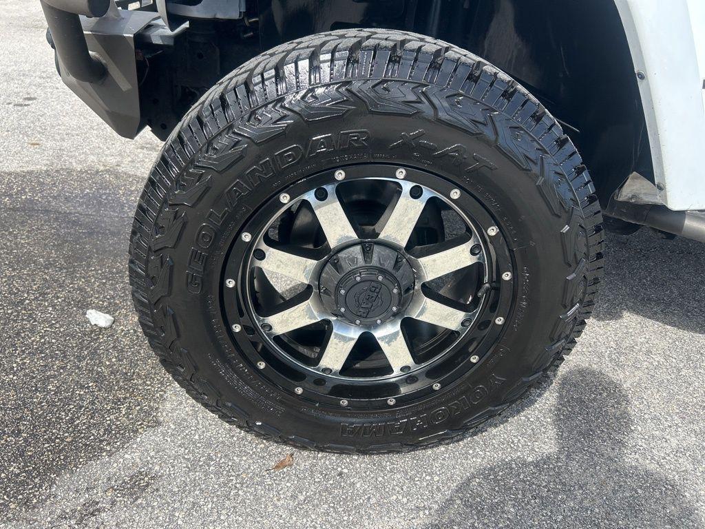 used 2014 Jeep Wrangler Unlimited car, priced at $15,345