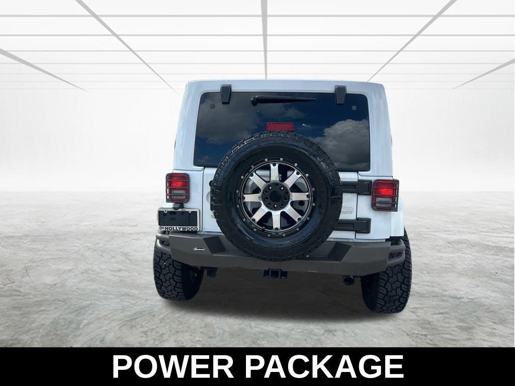 used 2014 Jeep Wrangler Unlimited car, priced at $15,345