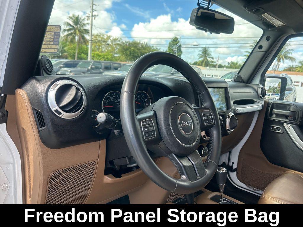 used 2014 Jeep Wrangler Unlimited car, priced at $15,345