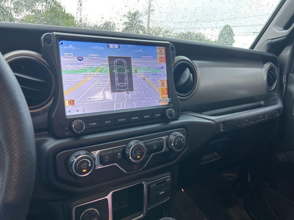 used 2021 Jeep Wrangler Unlimited car, priced at $27,320