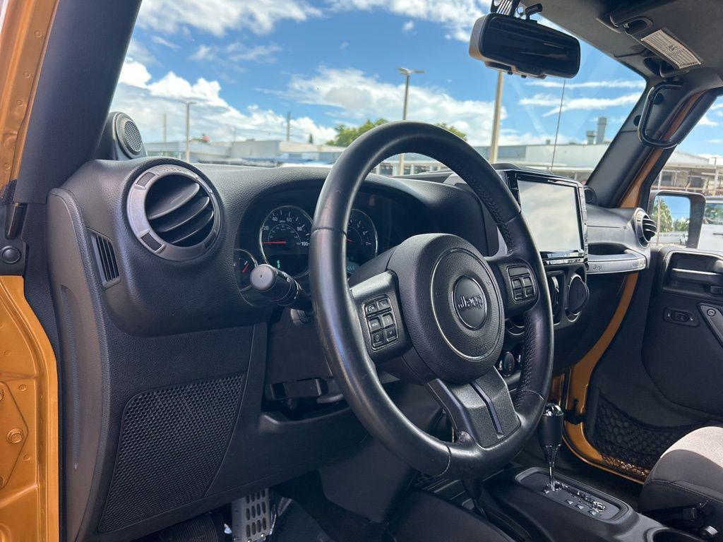 used 2014 Jeep Wrangler Unlimited car, priced at $12,952