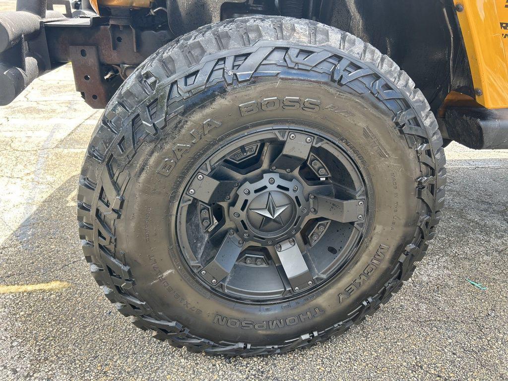 used 2014 Jeep Wrangler Unlimited car, priced at $12,952